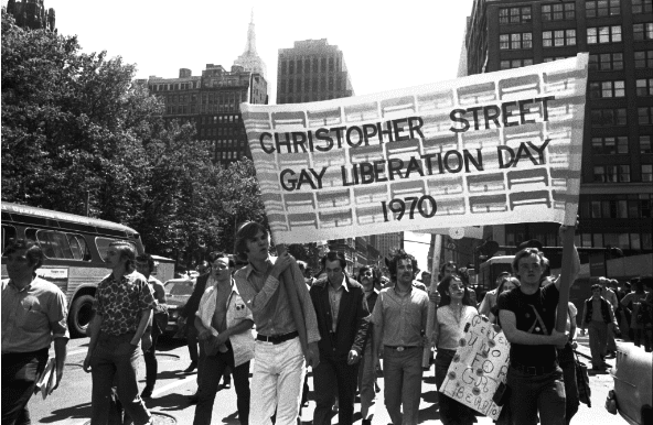 A black & white photo taken at the Christoper Street Gay Liberation Day Parade, 1970